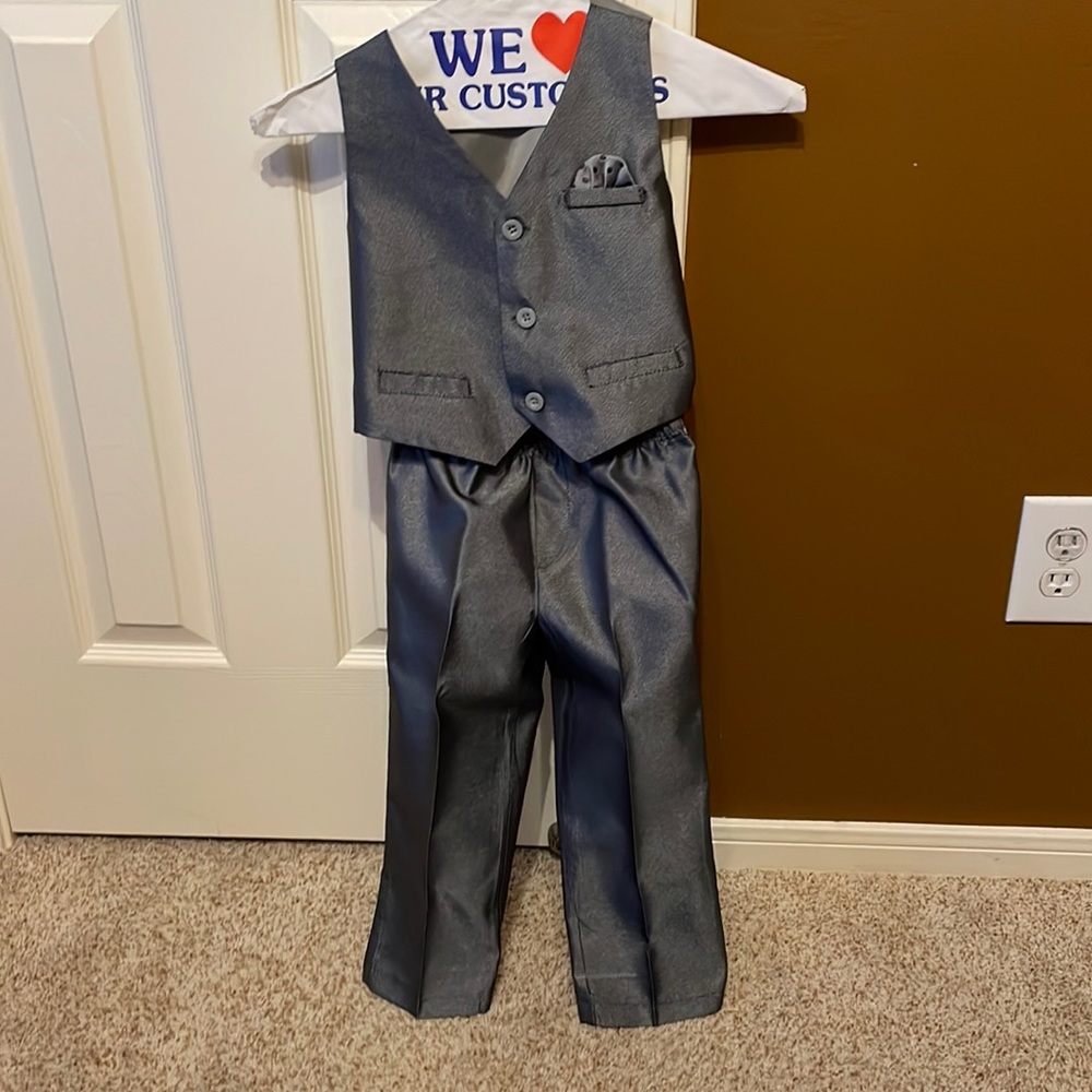Silver vest with matching pants and tie
